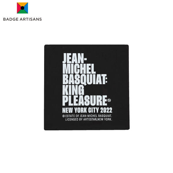 Backside of fridge magnet showing branding and copyright information in white on black background