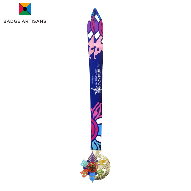 Full view of the World Junior Classic Powerlifting Championships Malta 2025 medal, including the gold-plated medal, colorful ribbon, and attached rotating star ornament.