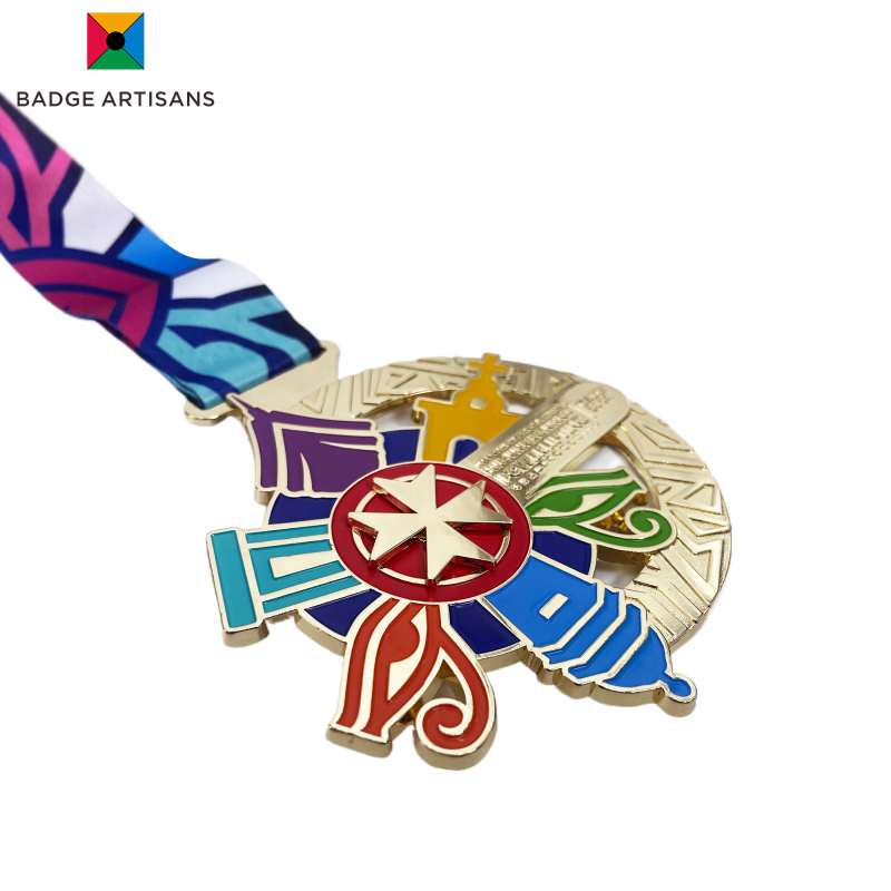 Detachable star-shaped badge from the World Junior Classic Powerlifting Championships Malta 2025 medal, gold-plated, can be used as a standalone pin or rotating ornament.